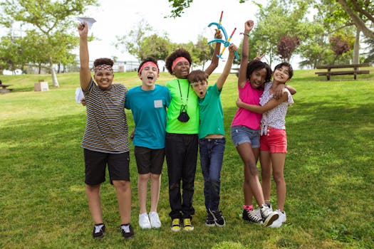 happy group of kids playing in the park