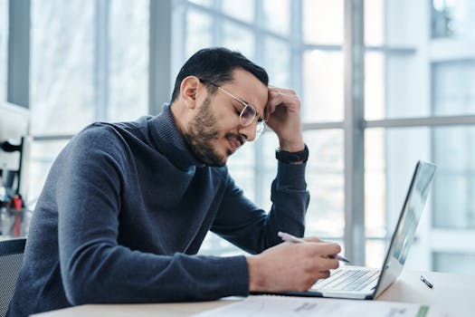 stressed professional at a desk