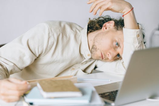 image of a stressed professional at work