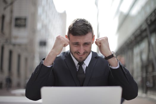 image of a happy professional celebrating a small victory